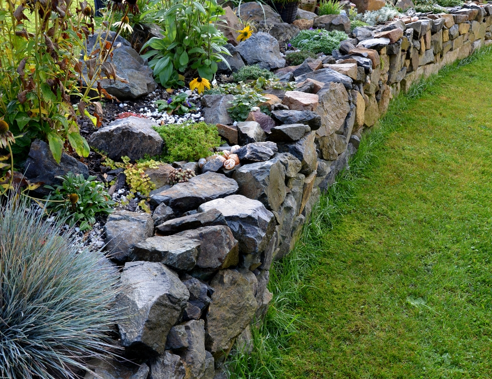 Earthworks Tauranga building strong block Retaining Walls Tauranga for long-lasting support and clean design.